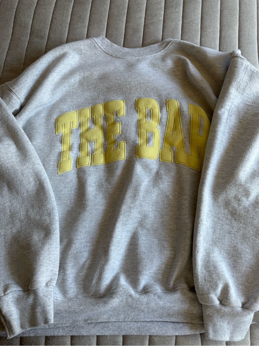 The Bar Gray Crewneck Sweatshirt with lemon Yellow Applique Logo